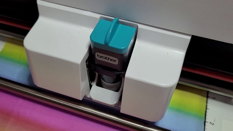 The rotary blade cutting fabric on the SDX200D Scan N Cut cutting machine