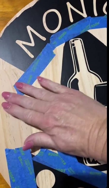 Apply masking or painter's tape to any areas that are close to the edge of the vinyl. This is to prevent the paste going over the edges.