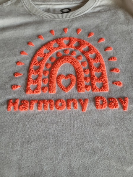 a different view of the Harmony Day T-shirt created with Zoom 3D Precision Heat Transfer Vinyl showing the texture better