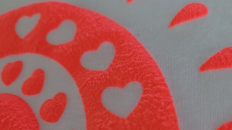 The 3D Puff Heat Transfer Vinyl after it has been transferred to the T-Shirt showing  the texture of the vinyl.