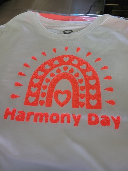 a view of the Harmony Day T-shirt created with Zoom 3D Precision Heat Transfer Vinyl