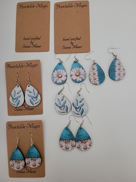 Using Creative Fabrica designs to quickly design sublimation earrings sublimated. Pictured ready for packaging.