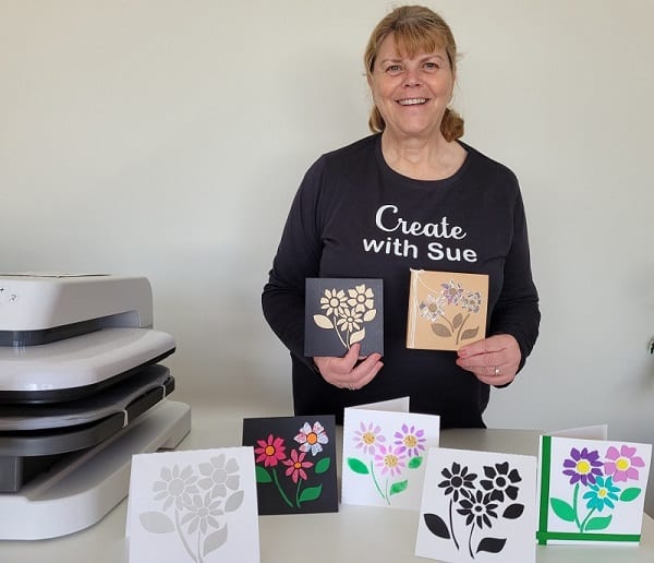 Picture of me, Create With Sue with some of the various cards that the stencil design can create.